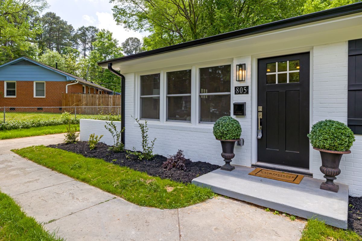 Front porch of a white brick house